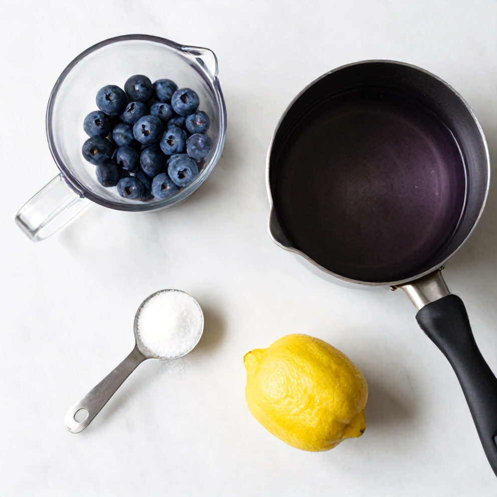 Ingredients for sugar free blueberry syrup on a wooden surface