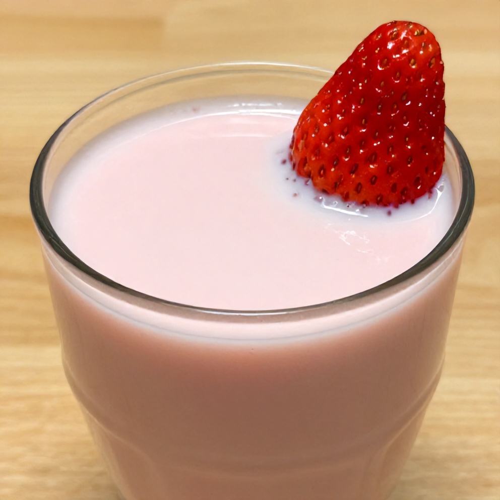 Glass of Korean strawberry milk with a strawberry garnish